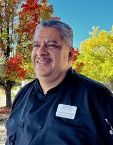 headshot of chef danny in a black chef's shirt